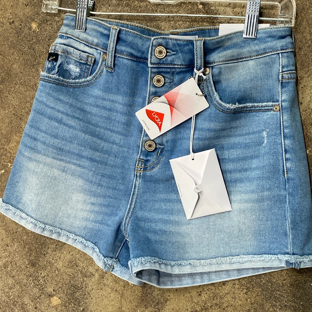 Brand new with tags high rise 5 button jean shorts. KanCan brand